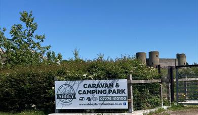 sign of campsite in gateway by rhuddlan castle