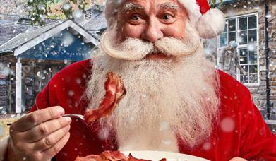 Santa eating breakfast