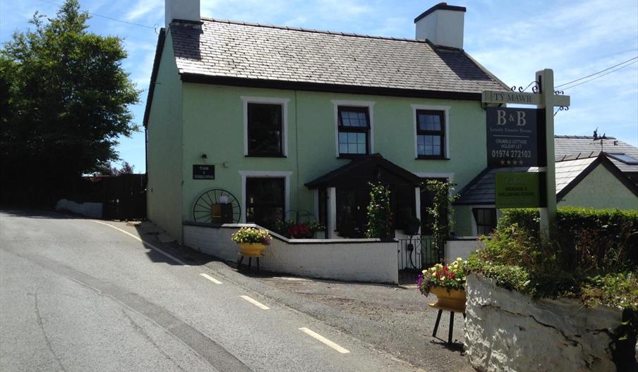 Situated high on the hills of Bethania, TyMawr B&B benefits from the stunning views overlooking Cardigan bay and amazing sunset displays.