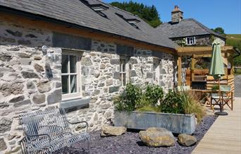 The outside of Star with outdoor seating area and kitchen.