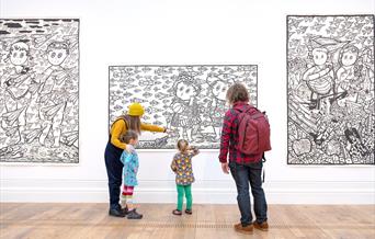 Image of family in gallery