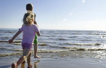 Ogmore is one of the most popular beaches for visitors along the Glamorgan Heritage Coast due to its expansive golden sands and fertile rock pools.