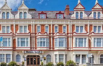 The Dunoon occupies two adjacent buildings on Gloddaeth Street, the avenue that links the North Shore to the West shore.