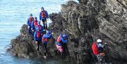 Coasteering group out in Rhoscolyn