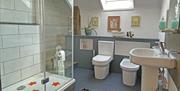 Large shower, WC and bidet, with wash basin