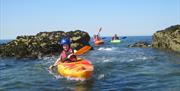 family kayaking session, Rhoscolyn, Anglesey